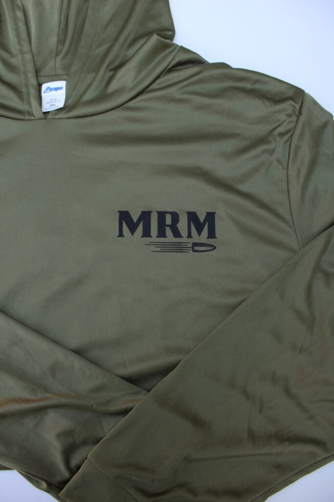 Olive-green jacket with an "MRM" logo on the chest and a white collar tag partially visible near the neck area.